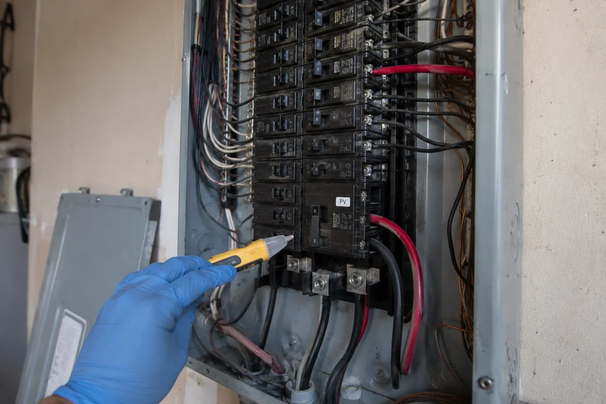 Solar backfeed breaker identified inside an open electrical panel during a Chula Vista home inspection