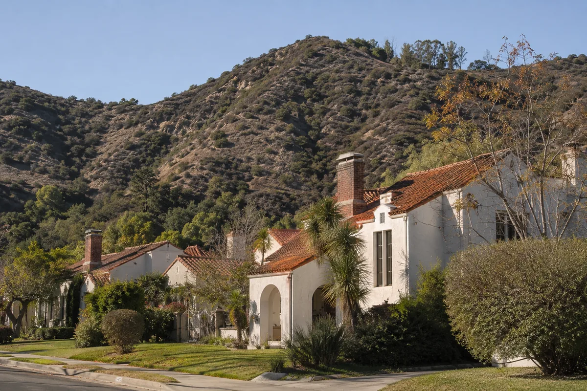 Wide view of an older Glendale foothill neighborhood of 1920s-1940s homes below the Verdugo Mountains